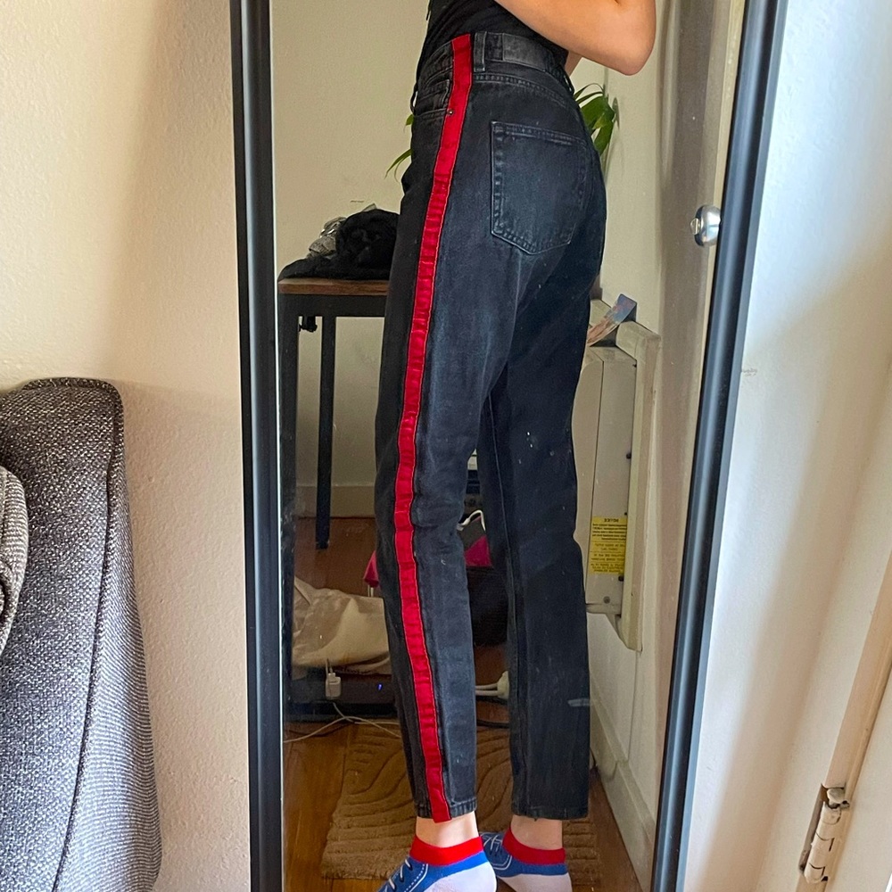 Monki black jeans with red stripe detailing
